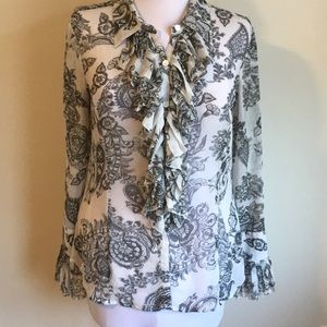 Cabi black and white paisley print shirt with ruffle down front and at sleeve